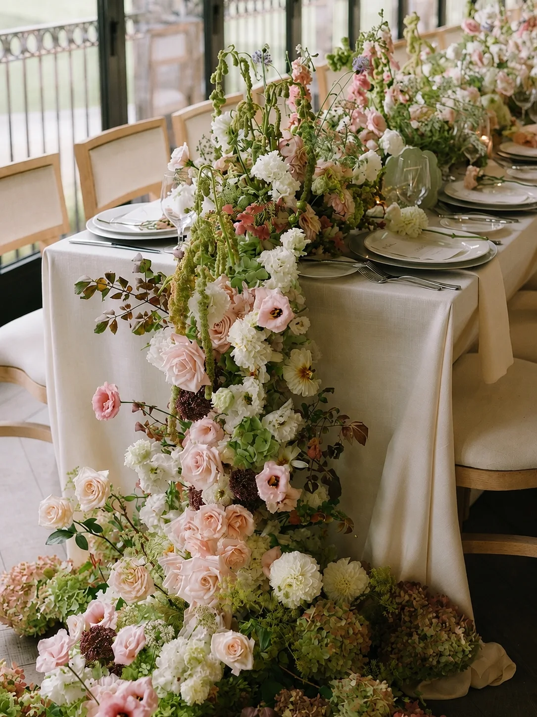 Cascading floral table runner in blush, white and green