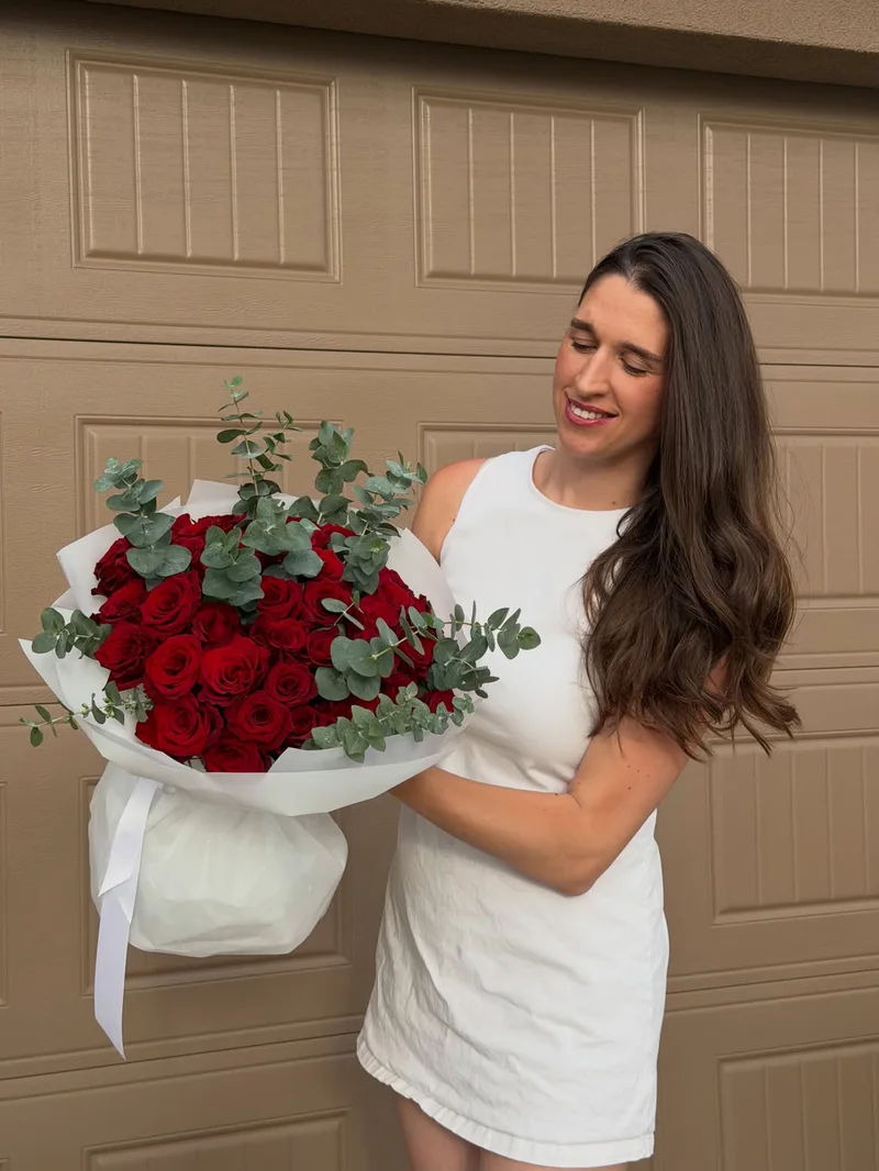Joy Flowers Studio on Instagram — 50 red roses with eucalyptus